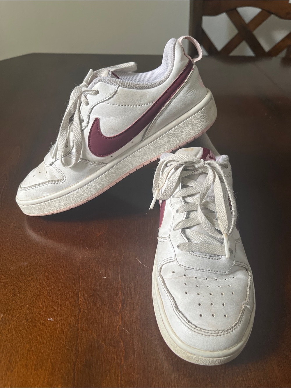 Nike Kids White Sneakers with Maroon Swoosh and Light Pink Details